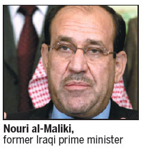 Iraq's Maliki steps down, backs rival