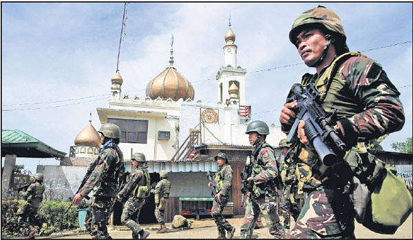 Manila tries to restore order in besieged city