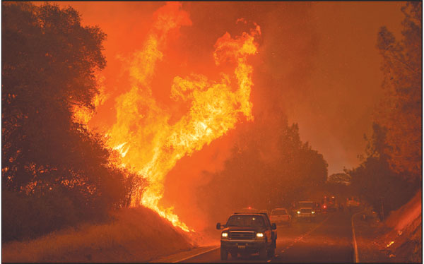 Thousands flee wildfires in California