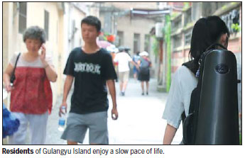 A nighttime stroll through narrow streets, happy crowds