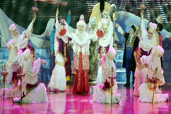 Actors perform Snowland Families in Xinjiang
