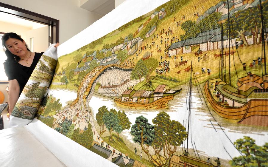 Cross-stitch work of 'Riverside Scene at the Qingming Festival'