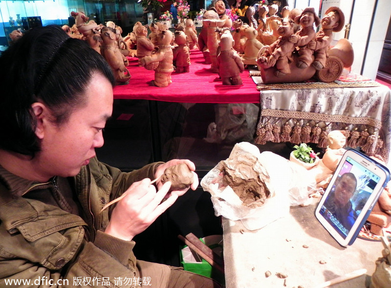 Folk artists display skills at temple fair