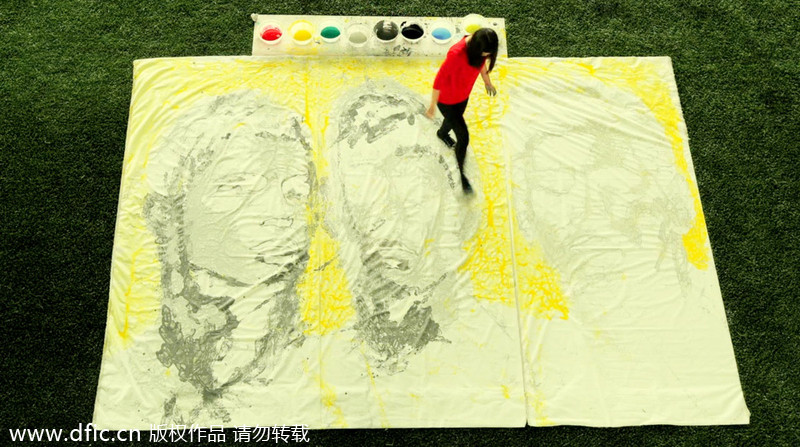 Painting World Cup stars with football