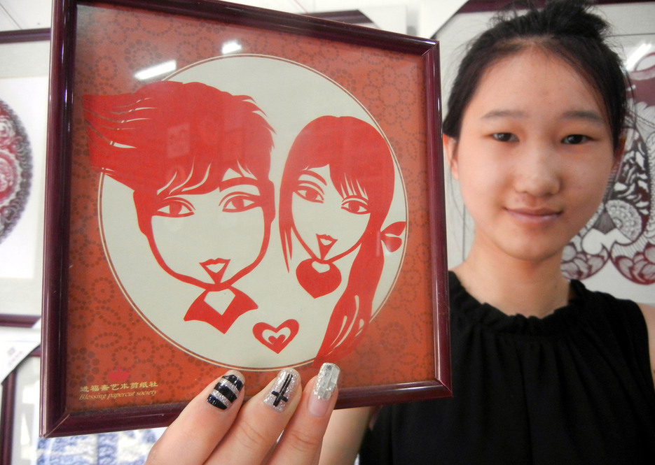 Chinese Valentine's Day embraced with paper-cuts