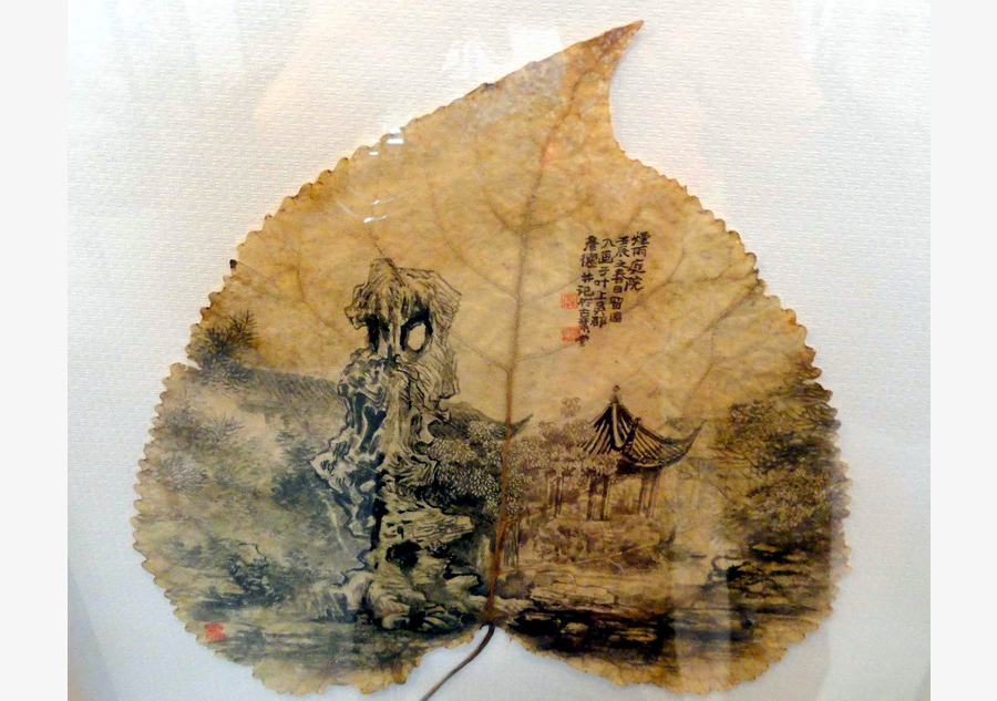 Artist creates Suzhou gardens on leaves