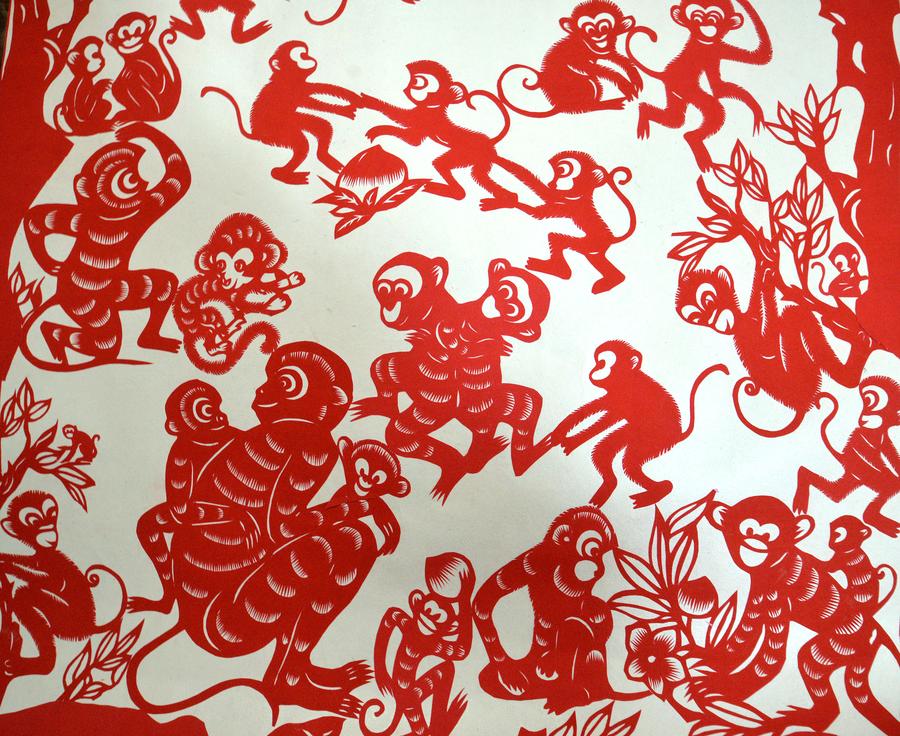 Folk artist makes paper-cut monkeys to celebrate new year