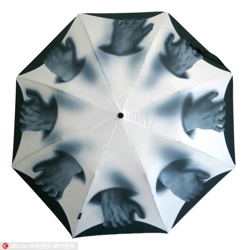 Artistic designs on umbrellas brighten up rainy days