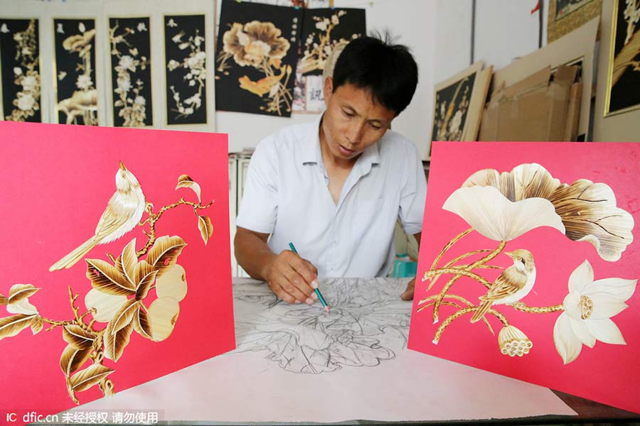 Turning straw to gold: folk artist's straw pyrography