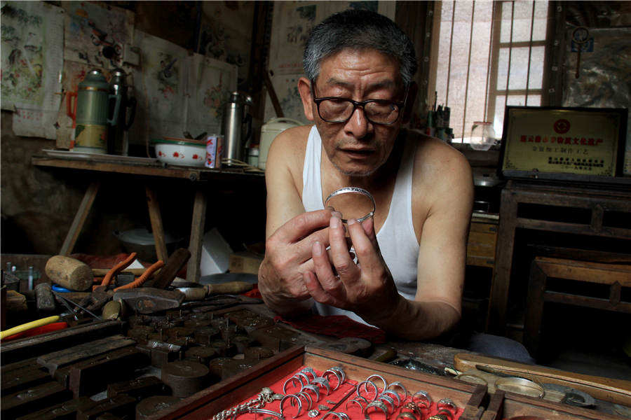 Craftsman sticks to handmade silver craft