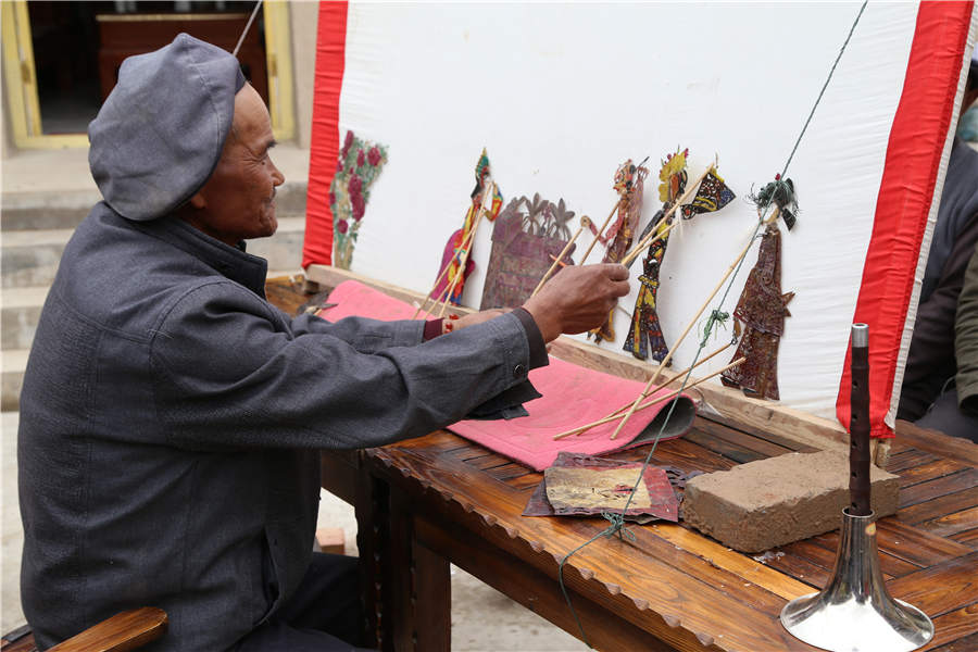 Endangered shadow play art lives on in rural China