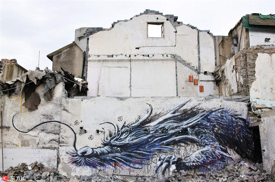 Graffiti works revive dilapidated walls