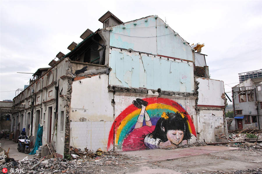 Graffiti works revive dilapidated walls