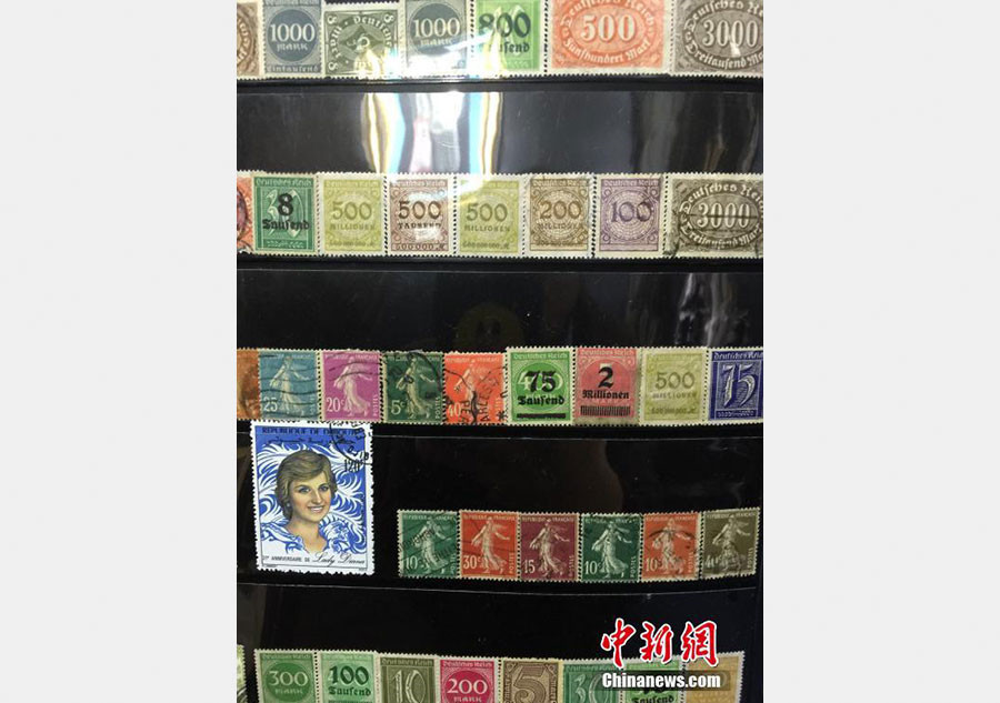 Amateur Chinese collector showcases 100 million stamps from around world