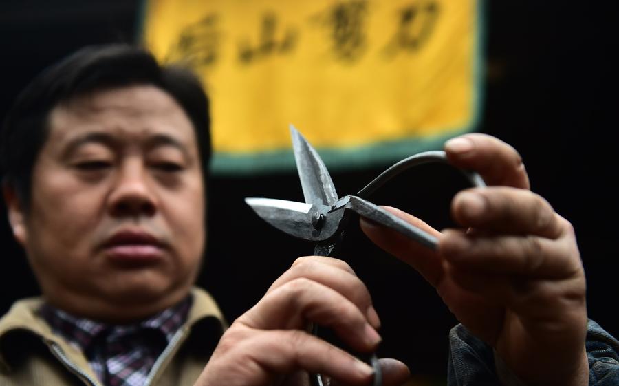 Craftsman makes scissors in traditional way