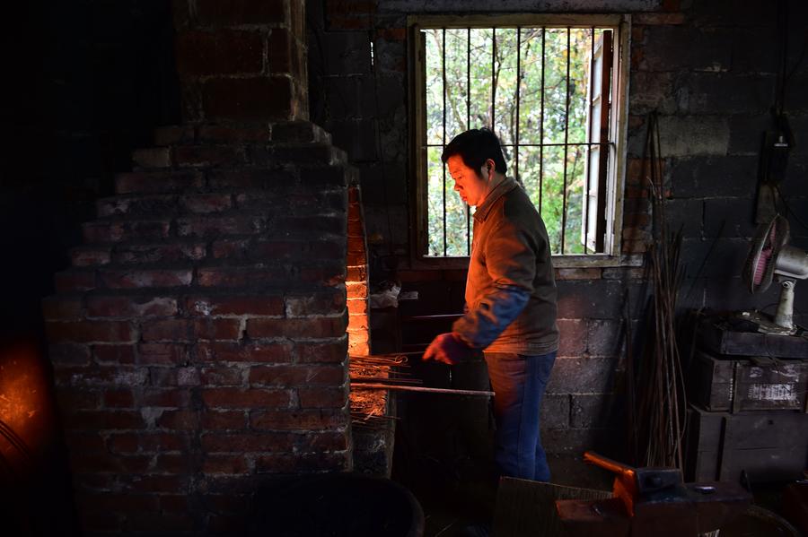 Craftsman makes scissors in traditional way