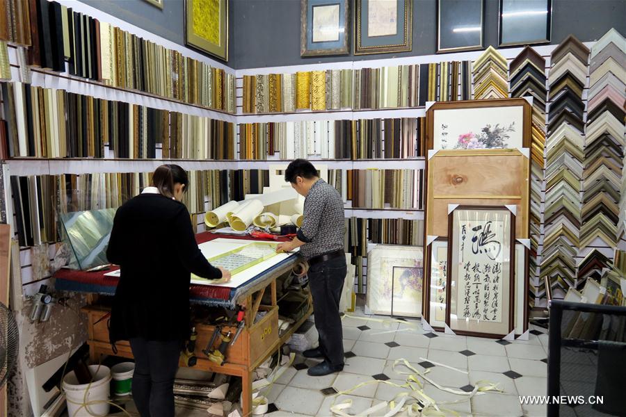S China's village famous for oil painting facsimile industry