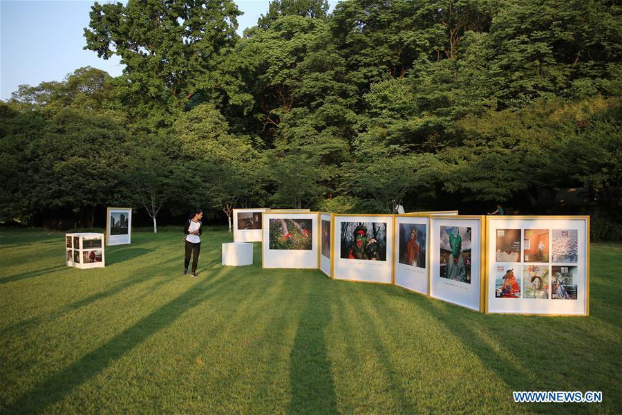 People visit photo exhibition in Hangzhou