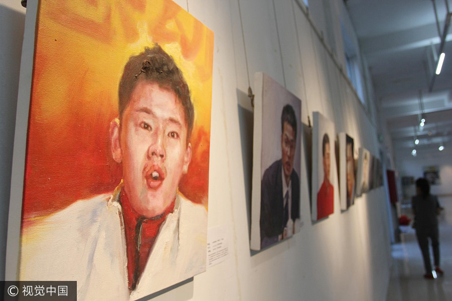 Oil paintings depict China's most inspiring role models