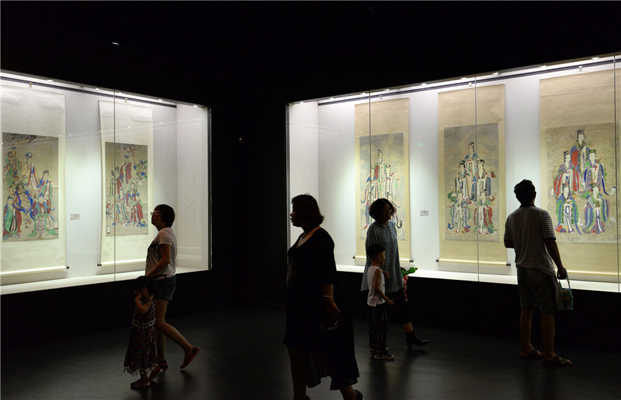 Buddhist paintings on display in N China