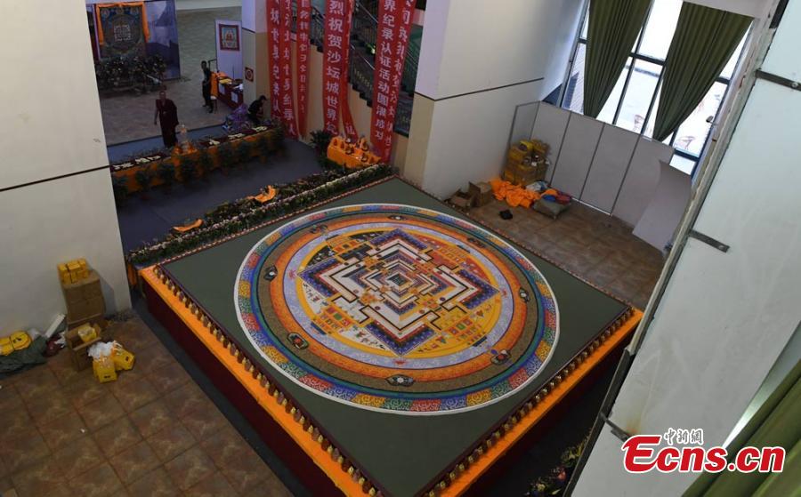 Sand mandala, 6.5 meters in diameter, on show in Dunhuang