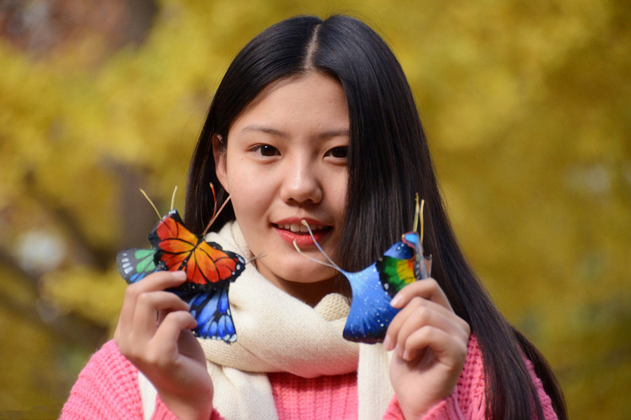 Butterflies on autumn leaves