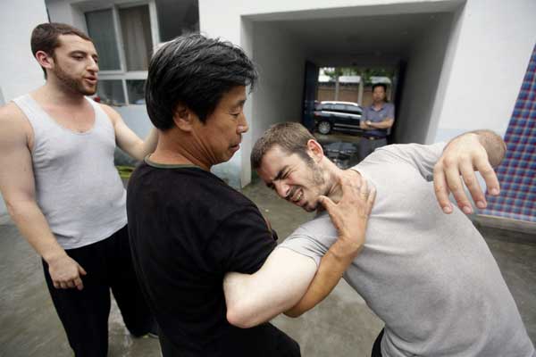 Martial arts master instructs foreigners