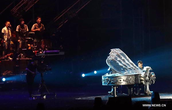 Singer Jay Chou performs during concert in Nanjing