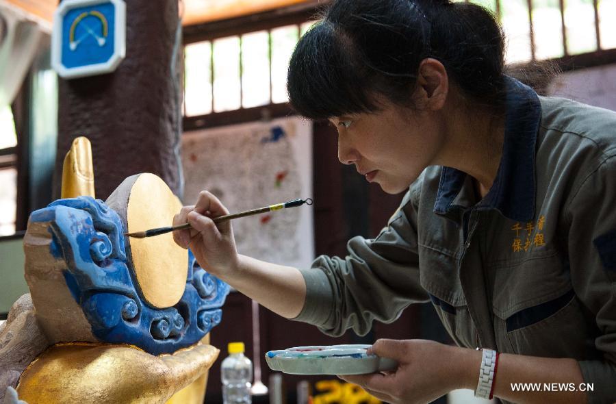 Restoration for sculpture of Qianshou Guanyin underway in Chongqing
