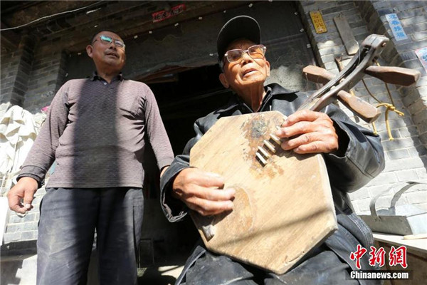 Old craftsman worries about future of shadow puppetry