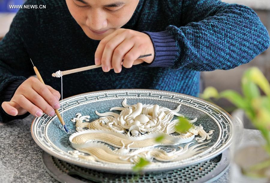 Lacquer thread sculpting listed as one of China's national intangible heritages