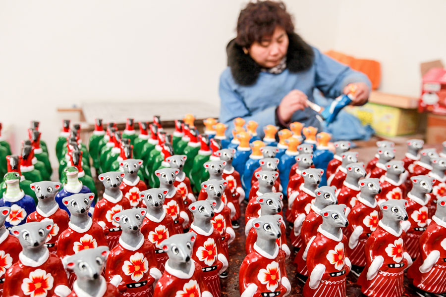 Artists create colorful, beautiful sculpture 'clay coo-coo' in Henan