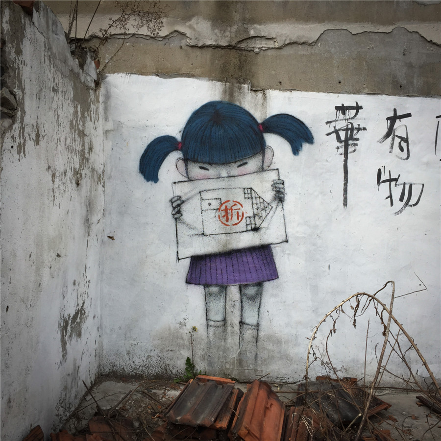 Graffiti on dismantled Shanghai Shikumen buildings