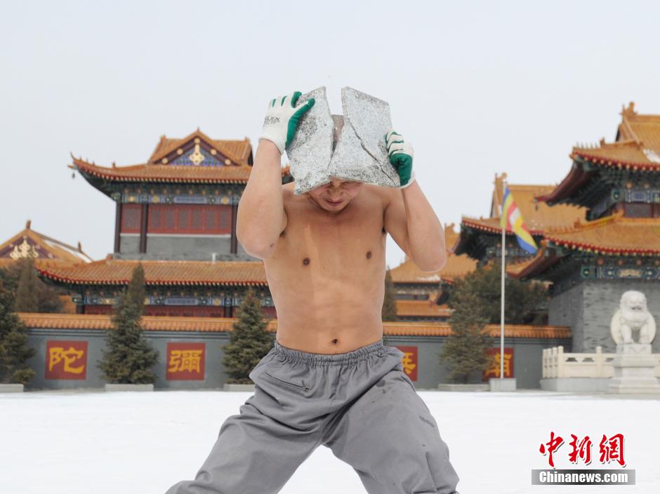 Monks practice Shaolin kung fu
