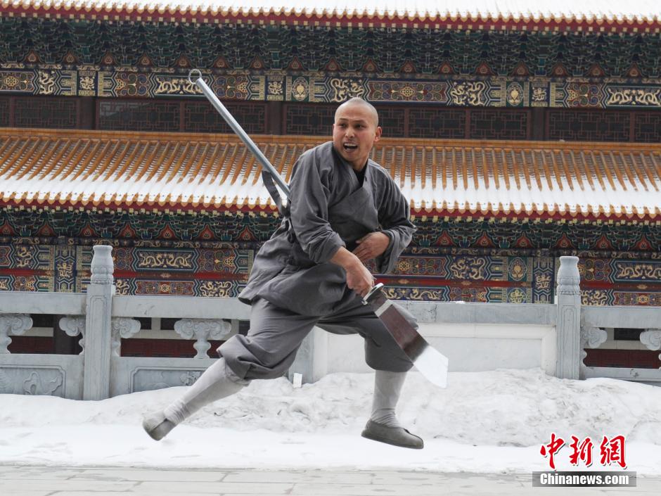 Monks practice Shaolin kung fu