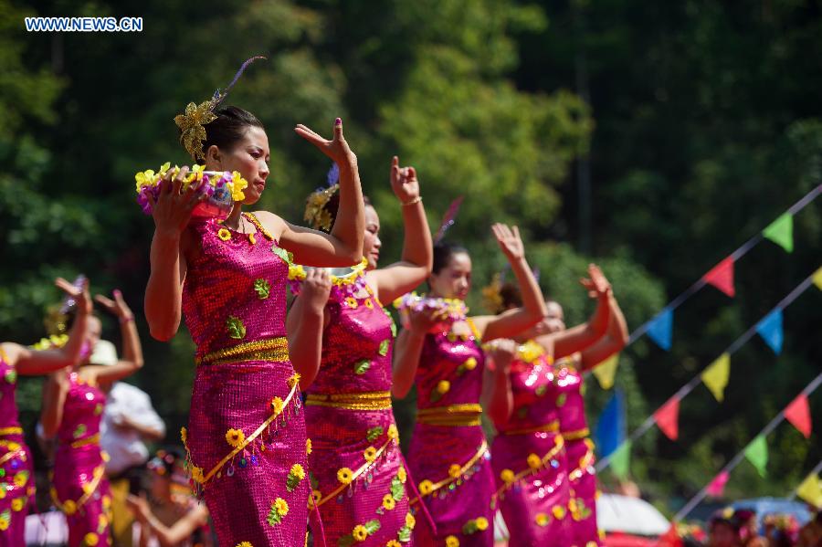 Celebration held for coming Water-Splashing Festival in SW China