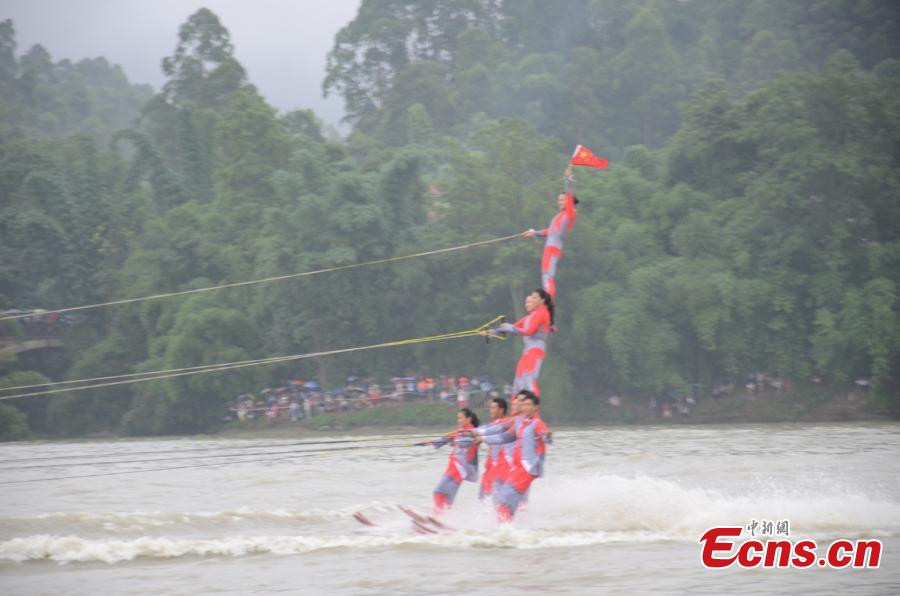 Waterskiing stunt performance at cultural festival