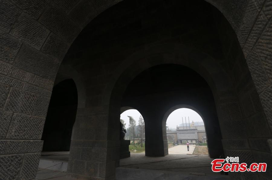 1,800-year-old temple under siege from high buildings in C China