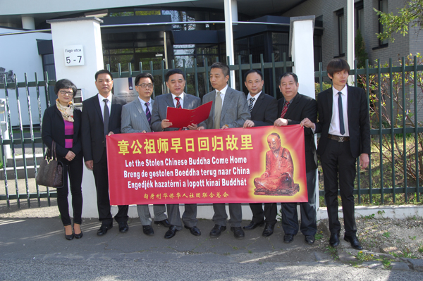 Village awaits return of Buddha statue with monk inside