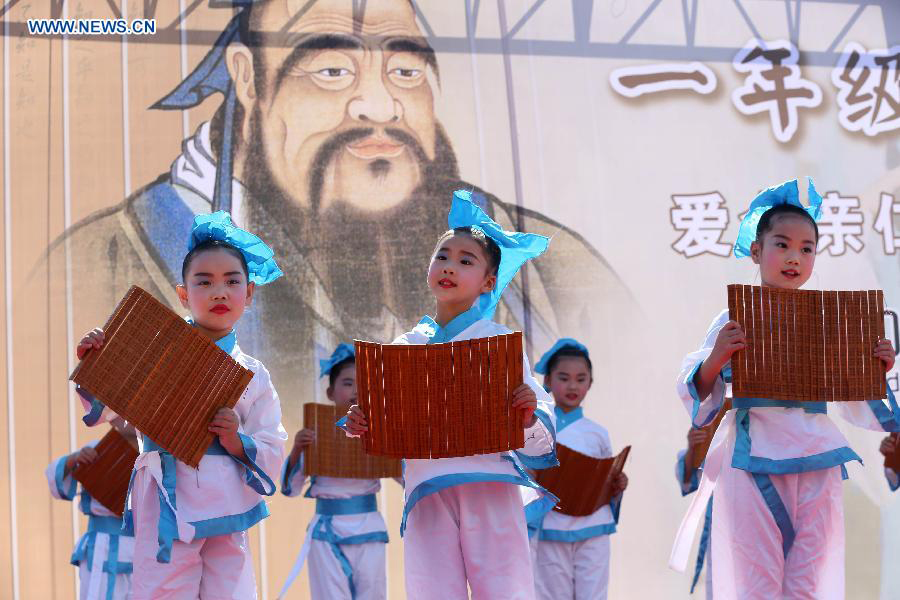 New first-graders attend traditional education activity in E China