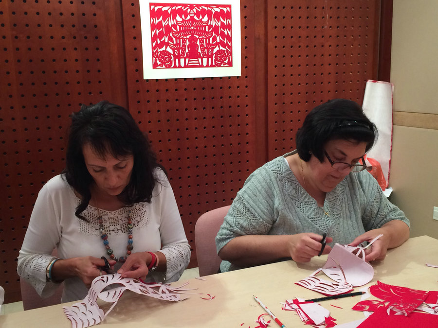 Maltese locals learn colorful art of paper-cutting