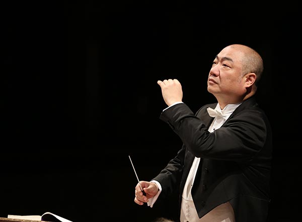 Pianist Xu finds it natural to grasp the baton