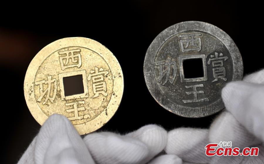 Gold plate among artifacts found in SW China site