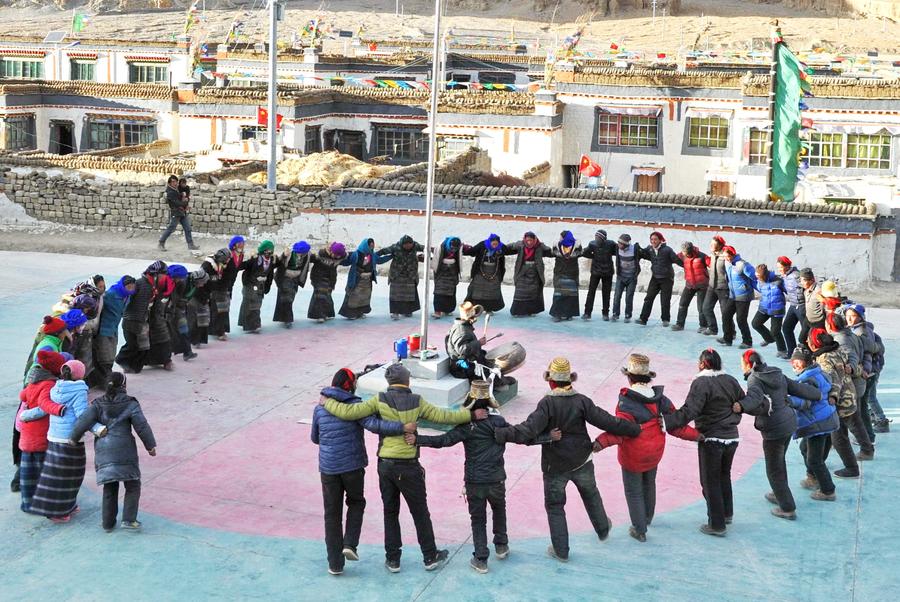 Villagers gather to dance 'Guozhuang' to celebrate Tibetan New Year
