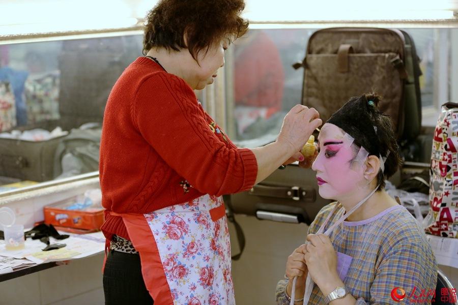 Backstage of a Chinese opera troupe