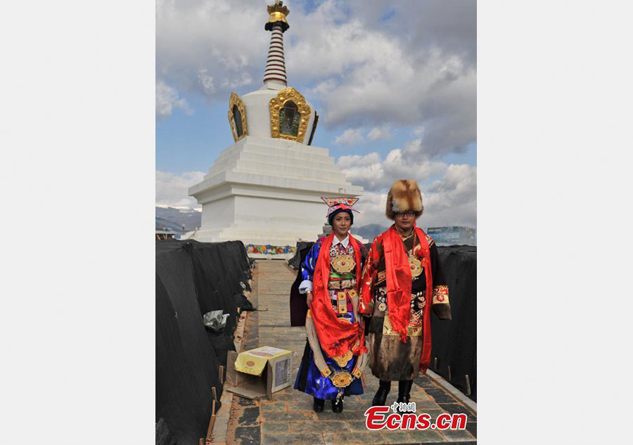 Young couple holds traditional Tibetan wedding ceremony