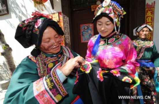 China raises allowance for intangible heritage practitioners