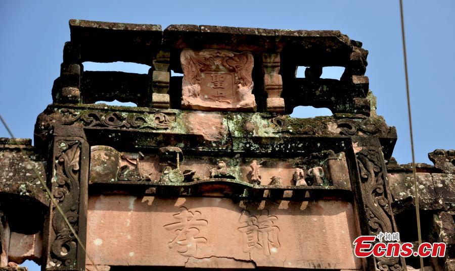 Uncared-for old memorial arch in ruins