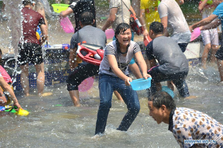 Water-sprinkling festival celebrated in SW China's Yunnan