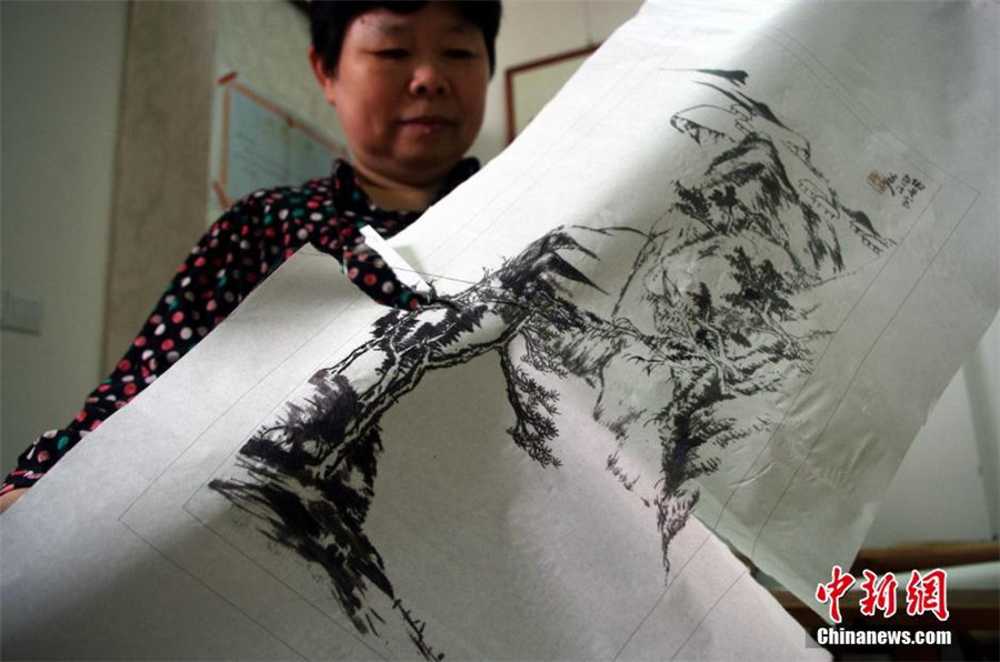 Embroidery on Chinese art paper: Innovation on traditional craft